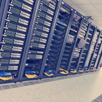 internet network server room with computers racks and digital receiver for digital tv